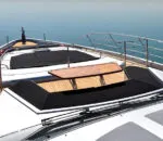 Luxury deck area on the Ghost II Superyacht overlooking the water.