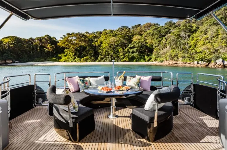 Elegant outdoor seating area on a Privacy Yacht for 36 Guests.