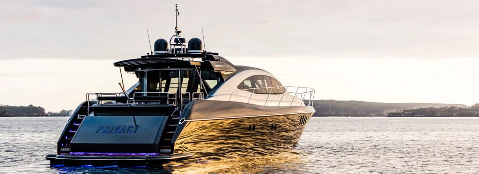 Luxury yacht named Privacy designed for 36 guests on calm waters.