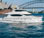 Luxury salt boat cruising near Sydney's iconic Opera House and Harbour Bridge.