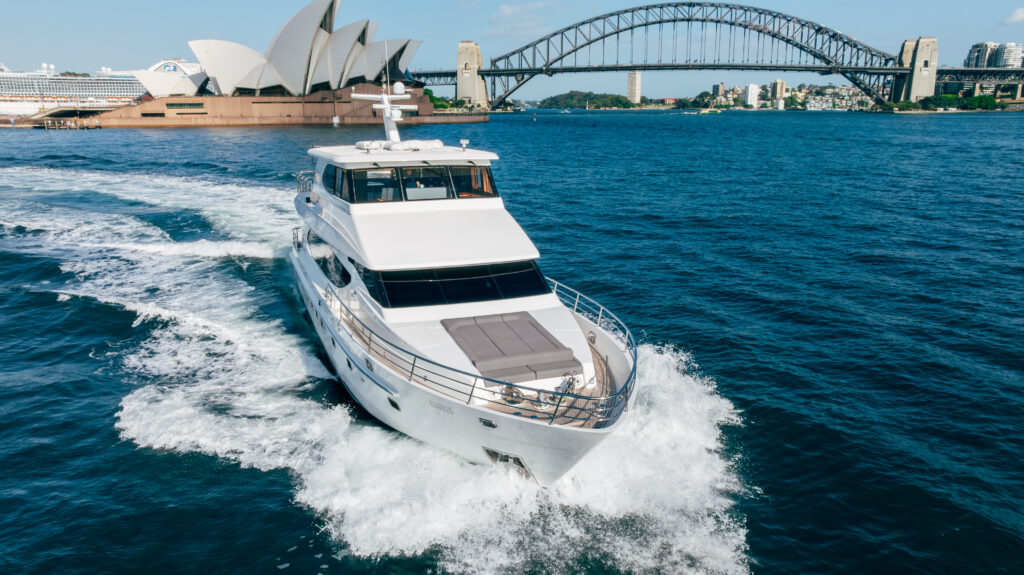 Luxury salt boat cruising in Sydney Harbour with iconic landmarks.