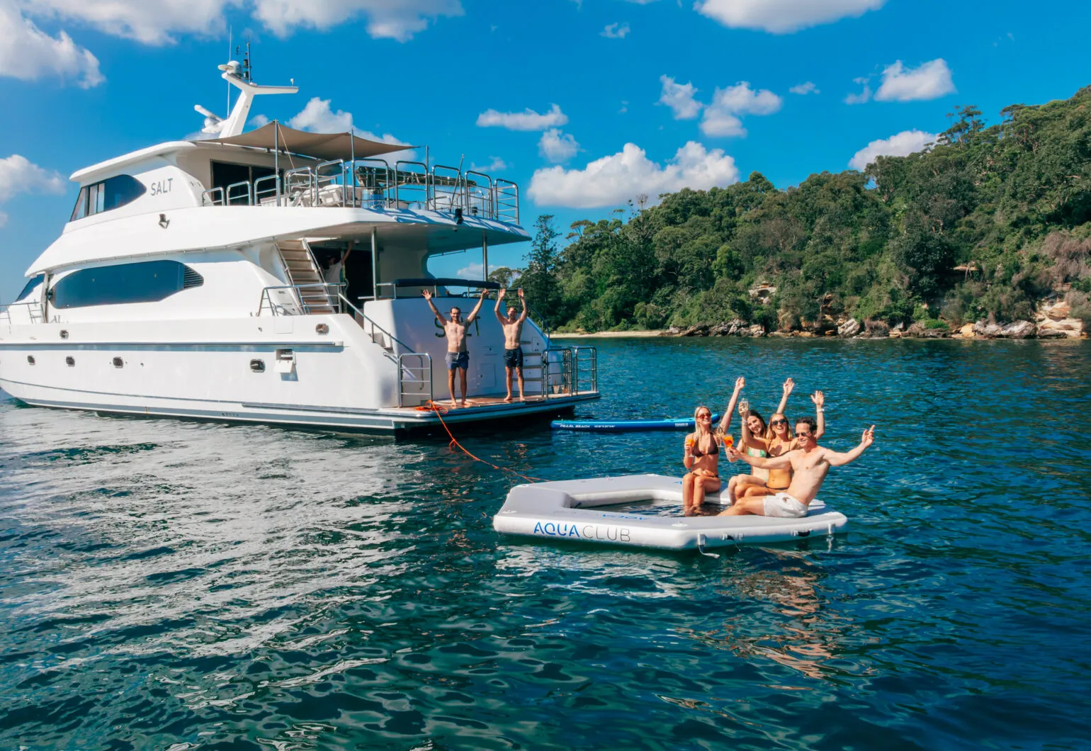 Group of friends enjoying a salt boat in Sydney's waters.