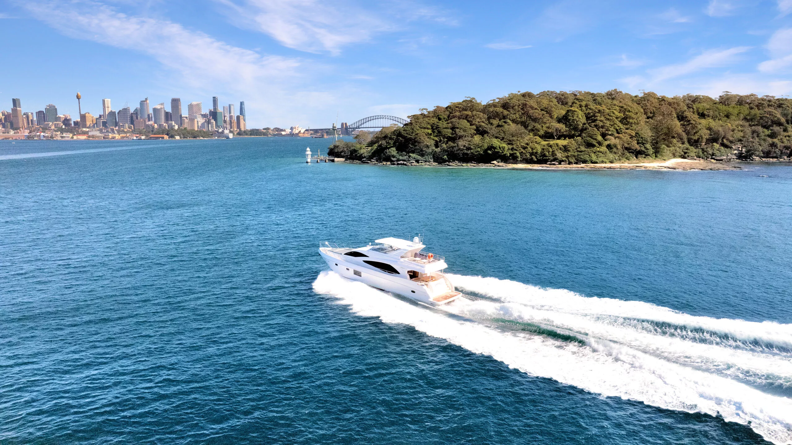 Empress – 77ft Motoryacht by Dreamboats Empress 77ft motoryacht cruising across open water by Dreamboats