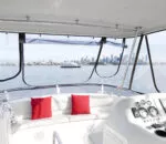 View from the cockpit of Life’s Good catamaran overlooking the city skyline.