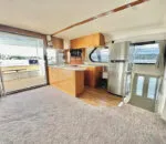Spacious interior of a Passion Catamaran with modern kitchen amenities.