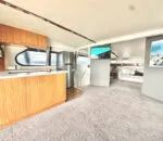 Spacious interior of a Passion Catamaran with modern kitchen and lounge area.