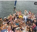 Group of people enjoying an ocean life catamaran charter in Sydney.