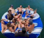 Group of people enjoying a fun gathering on a large inflatable float.