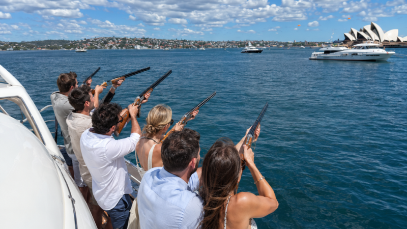 Lasershoot-Laserclayshooting-Hire-Sydney-Yacht Guests enjoying laser clay shooting from a boat on Sydney Harbour